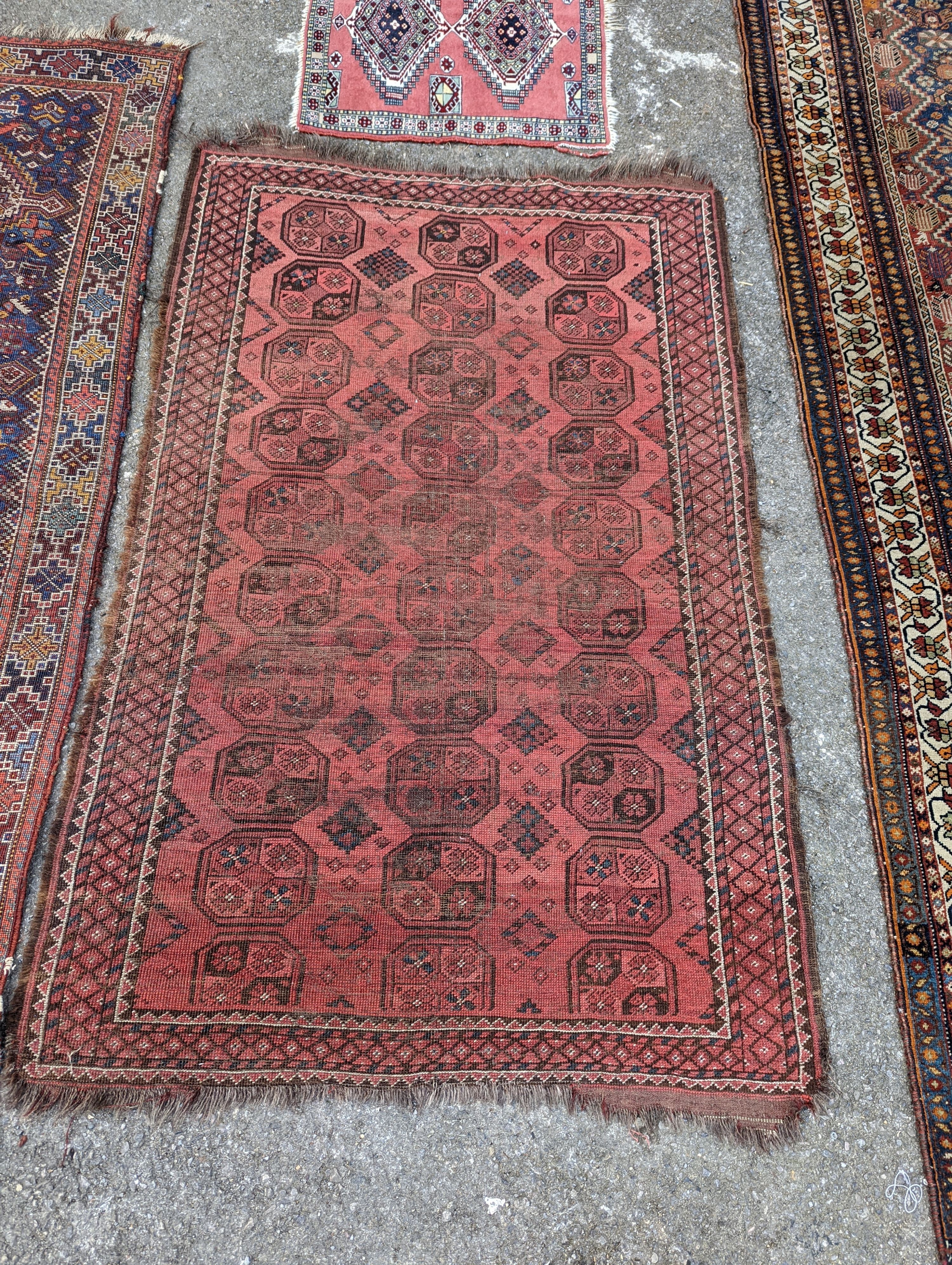 A North West Persian blue ground runner, 300 x 109 (worn and holed) a North West Persian rug, Bohara rug and mat